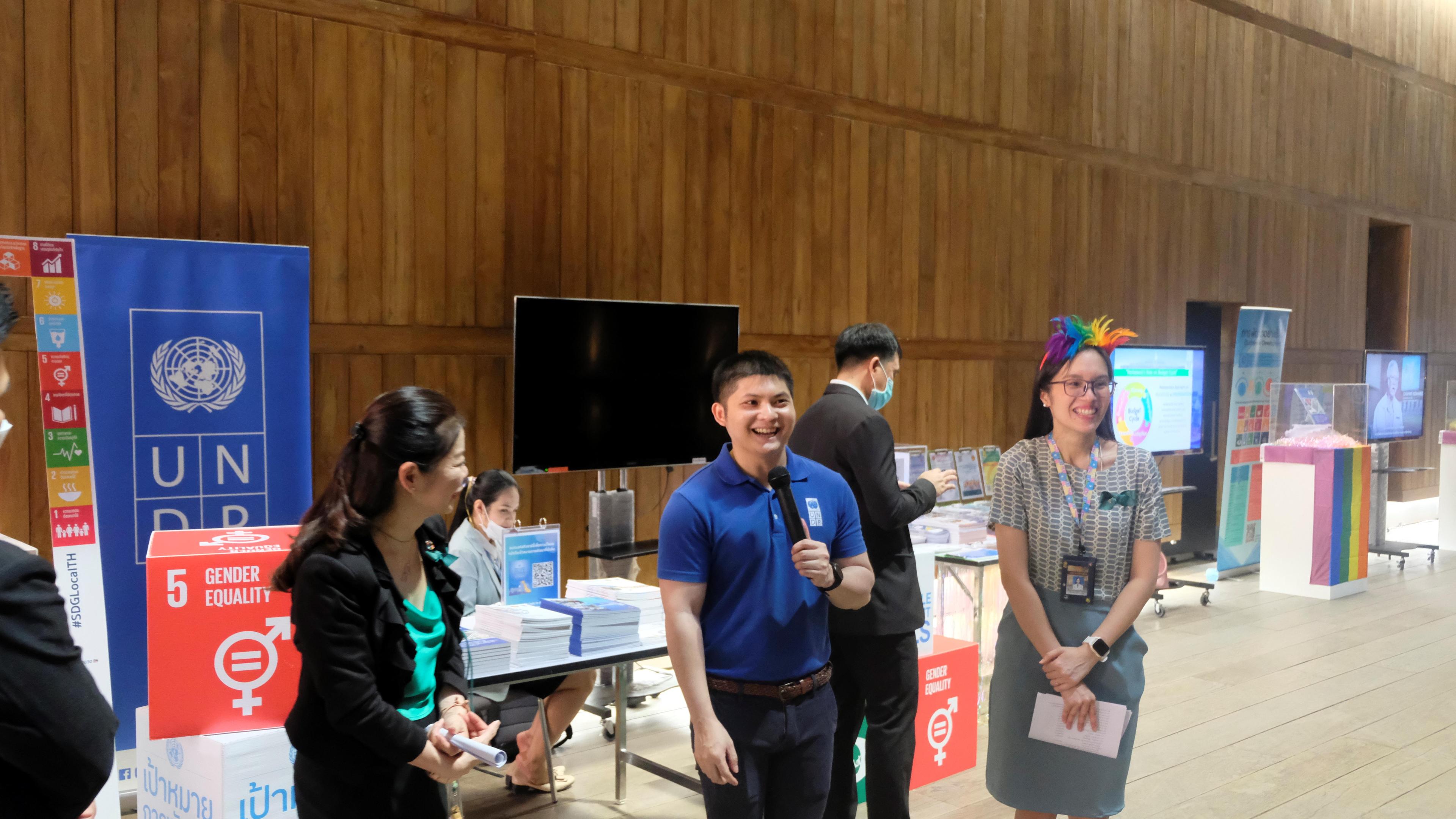 a group of people standing in a room