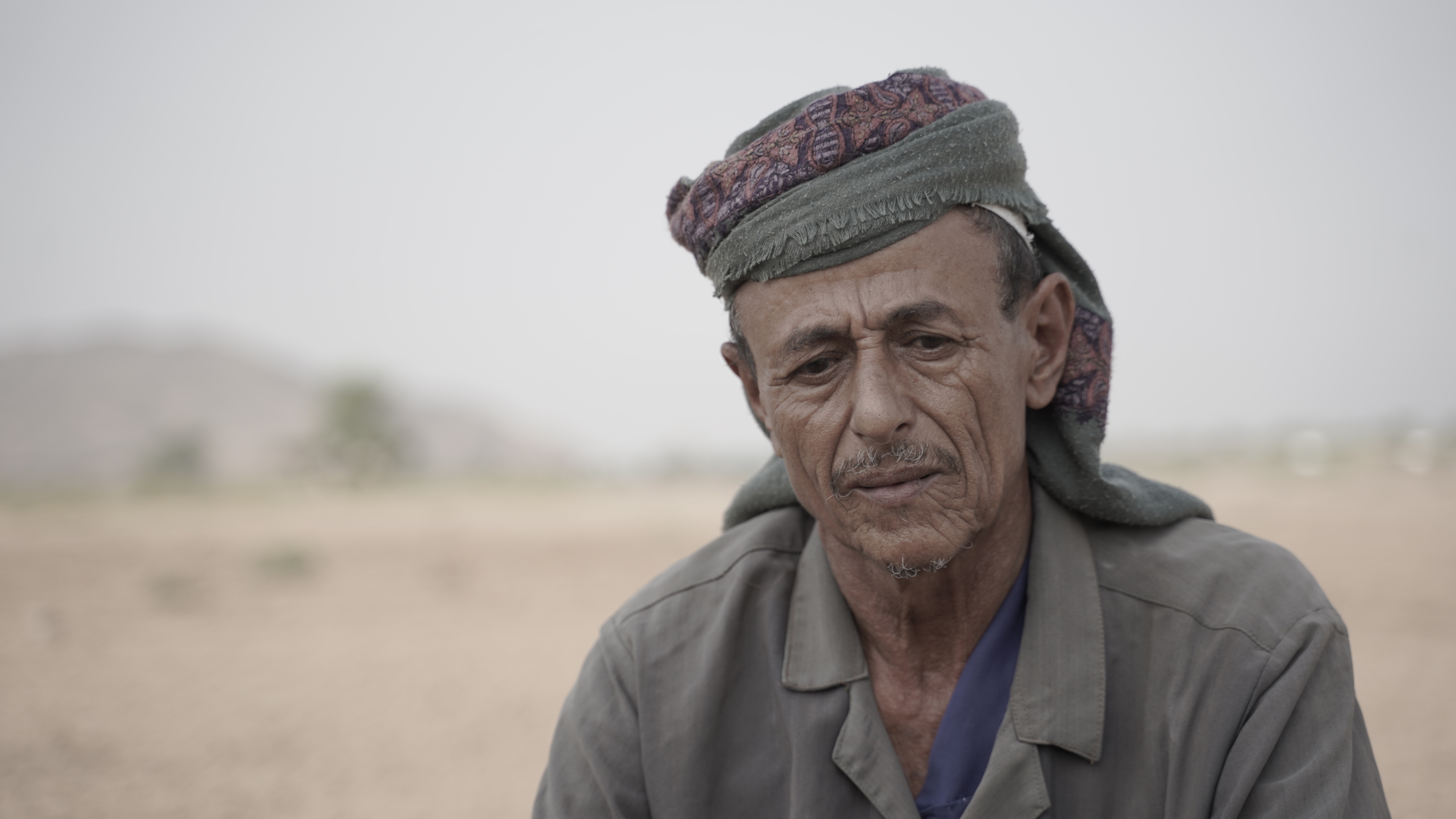 a man wearing a hat