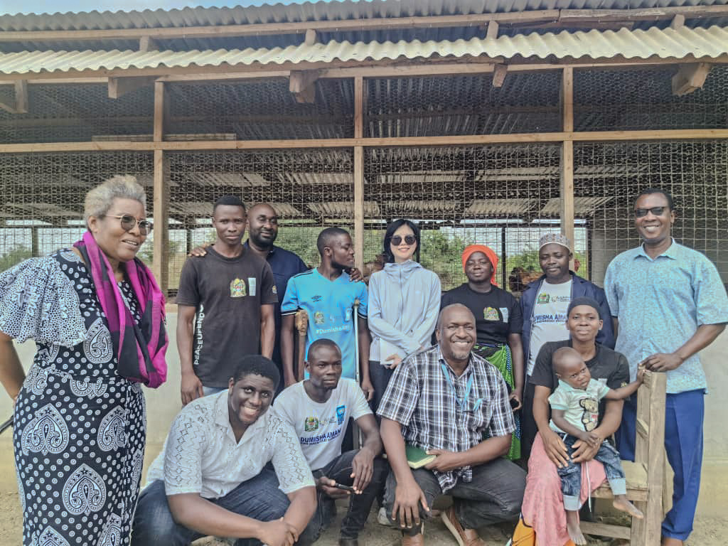 a group of people posing for a photo