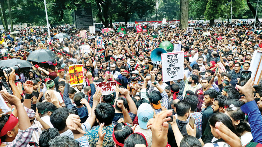 a group of people standing in front of a crowd